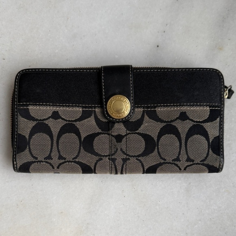 Coach Legacy Signature C jacquard and leather wallet.